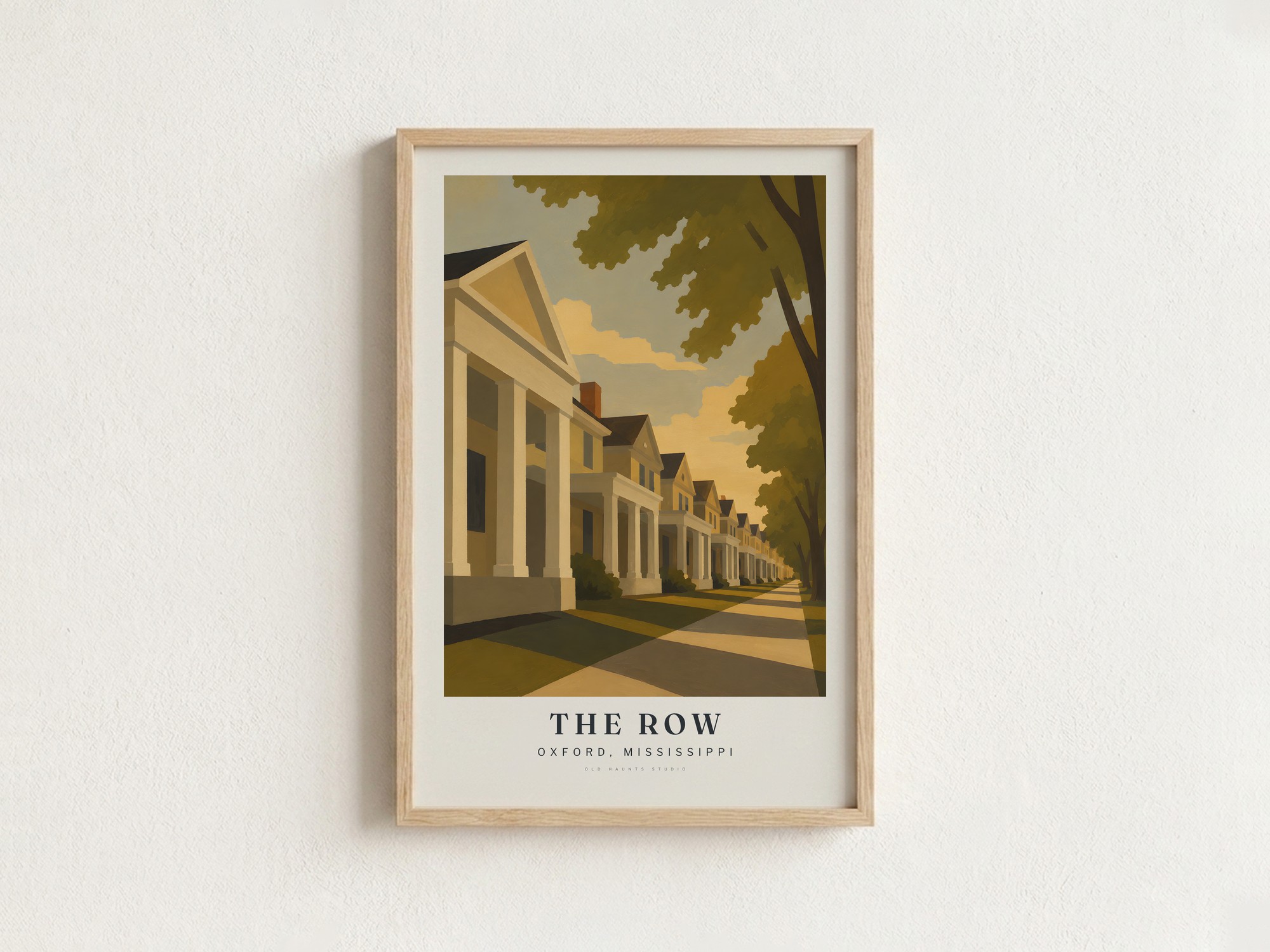 THE ROW som indrammet plakat på en væg